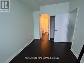 Toronto (Waterfront Communities) condo for rent - A room with a white door and a white wall.