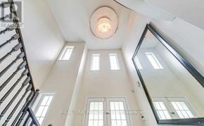 Oakville (Wt West Oak Trails) apartment for rent - A white room with a spiral staircase leading to the ceiling.