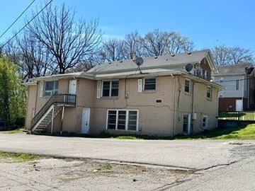 Nashville apartment for rent - A two-story house with a satellite dish on the roof.