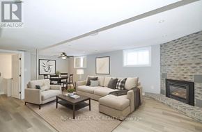 Welland (N. Welland) apartment for rent - A living room with a fireplace and a couch.