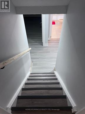 Brampton (Northgate) apartment for rent - A hallway with a wooden floor and white walls.