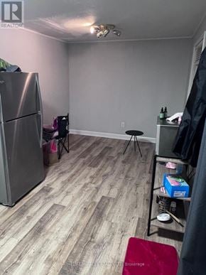 Brampton (Northgate) apartment for rent - A kitchen with a refrigerator and a small table.