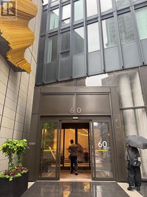 Toronto (Church-Yonge Corridor) condo for rent - The number 60 is displayed on the front of a building.