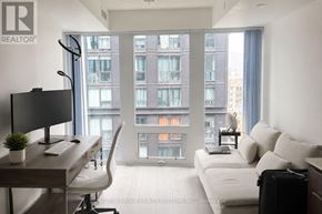 Toronto (Church-Yonge Corridor) condo for rent - A modern living room with a view of a cityscape through large windows.