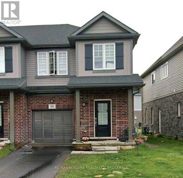 Welland (West Welland) townhouse for rent - A house with the number 93 on the front door.