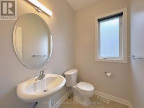 Oakville (Wm Westmount) apartment for rent - A white sink and toilet in a small bathroom.