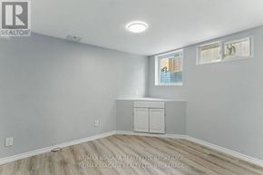 Welland (Lincoln/Crowland) apartment for rent - A room with a grey wall and a white cupboard.