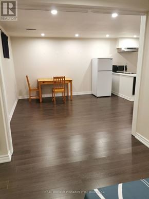 Toronto (Newtonbrook West) apartment for rent - A dining room with a table and chairs.