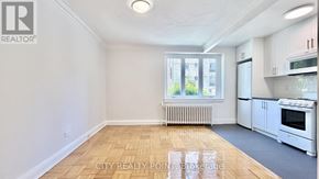 Toronto (Casa Loma) condo for rent - A realtor logo is on the top left corner of the image.