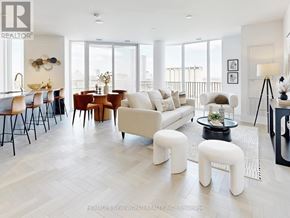 Toronto (Waterfront Communities) condo for rent - A well-lit, modern living room with a dining area and kitchen in the background.