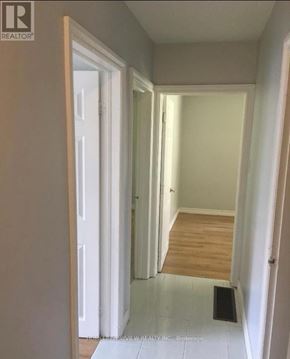 Newmarket (Huron Heights-Leslie Valley) apartment for rent - A hallway with a door on the left and a door on the right.
