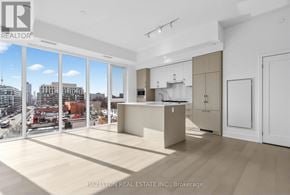 Toronto (Yonge-Eglinton) condo for rent - A spacious, well-lit room with a large window overlooking a cityscape.