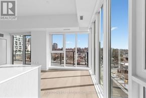 Toronto (Yonge-Eglinton) condo for rent - A real estate office with a view of the city.