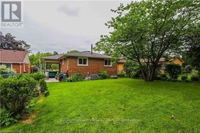 London South (South G) apartment for rent - A house with a green lawn in front of it.