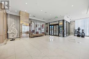 Toronto (Banbury-Don Mills) condo for rent - A spacious, well-lit lobby with a marble floor and modern furnishings.