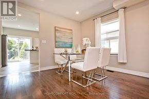 Toronto (Woodbine-Lumsden) apartment for rent - A dining room with a table and chairs.
