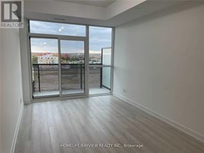 Barrie (Painswick South) condo for rent - A room with a view of a construction site through the window.