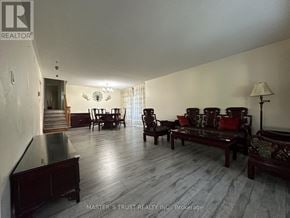 Markham (Thornhill) apartment for rent - A living room with a couch, chairs, and a table.