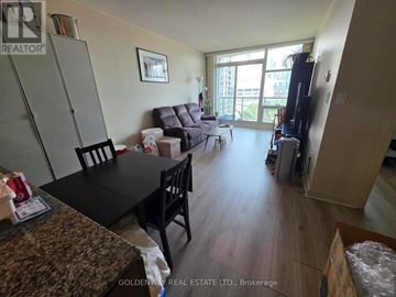Toronto (Waterfront Communities) condo for rent - A living room with a black table and chairs.