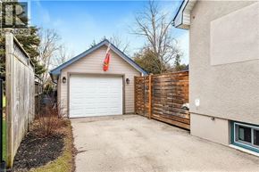Niagara-On-The-Lake apartment for rent - A garage with a red flag on top is attached to a house.