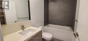 Toronto (Humewood-Cedarvale) condo for rent - A bathroom with a sink, toilet and bathtub.