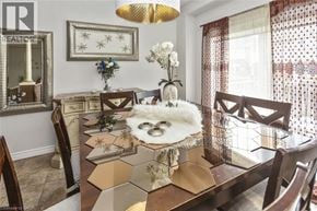 Hamilton apartment for rent - A dining room with a table set for a meal.