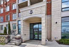 Kitchener condo for rent - The front entrance to a building with the number 175 on it.