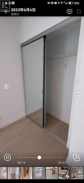 Toronto (Church-Yonge Corridor) condo for rent - A room with a sliding door and a wooden floor.