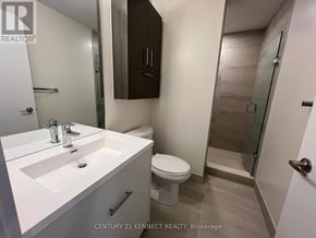 Toronto (Don Valley Village) condo for rent - A bathroom with a sink, toilet and shower.