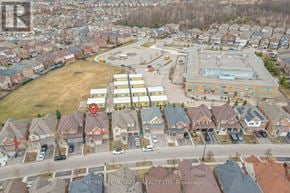 Brampton (Northwest Brampton) apartment for rent - An aerial view of a residential area with a HomeLife/Miracle Realty Ltd. sign.