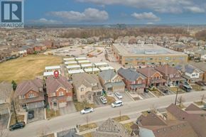 Brampton (Northwest Brampton) apartment for rent - A bird's eye view of a residential area with a large building in the center.