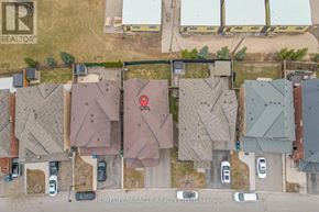 Brampton (Northwest Brampton) apartment for rent - An aerial view of a neighborhood with a red pin marking a specific house.