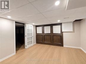 Welland (N. Welland) apartment for rent - A room with a white door and brown cabinets.