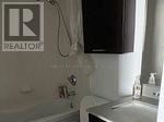Toronto (Bay Street Corridor) condo for rent - A bathroom with a sink and a tub.