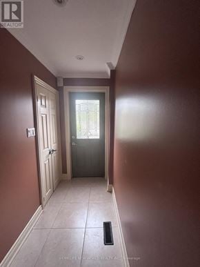 Toronto (Rockcliffe-Smythe) apartment for rent - A hallway with a door and a window.