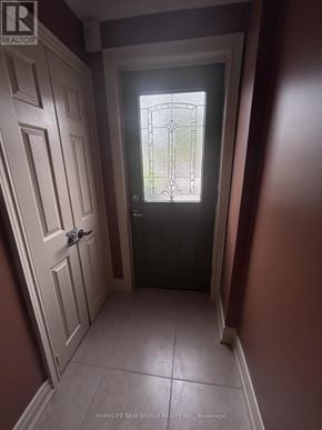 Toronto (Rockcliffe-Smythe) apartment for rent - A doorway with a glass window and a wooden door.