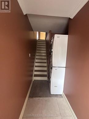 Toronto (Rockcliffe-Smythe) apartment for rent - A staircase with a white refrigerator on the landing.