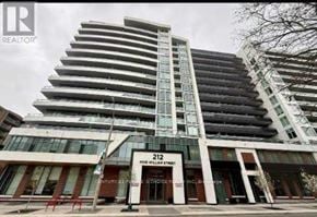 Hamilton (Beasley) condo for rent - A tall building with the number 212 on it.