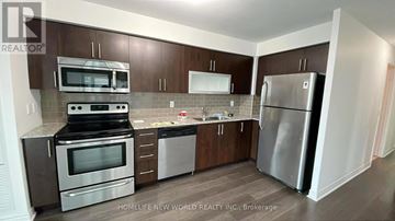 Toronto (Bendale) condo for rent - A kitchen with a stove top oven, microwave, refrigerator, and dishwasher.