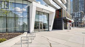 Mississauga (City Centre) condo for rent - A modern building with the number 17900 on it.