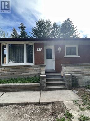 Kitchener apartment for rent - A house with the number 37 on it.