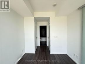 Toronto (Bay Street Corridor) condo for rent - A hallway with a door on the right and a door on the left.