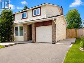 Ottawa apartment for rent - A two-story house with a garage is for sale.
