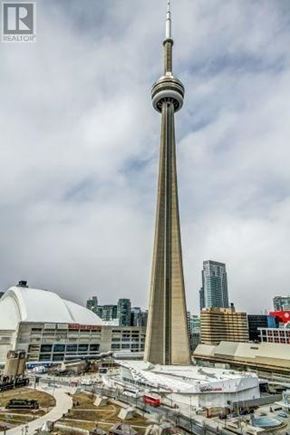 Toronto (Waterfront Communities) condo for rent - The CN Tower is a tall, slender, and pointed structure.