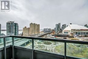 Toronto (Waterfront Communities) condo for rent - A cityscape viewed from a high-rise building with a realtor logo in the corner.