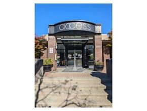 Surrey apartment for rent - The front of a building with the word "ACCESS" written on it.