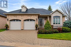 London North (North B) house for rent - A house with a brick facade and a large driveway.