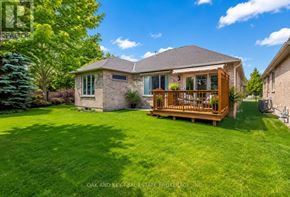 London North (North B) house for rent - A house with a well-maintained lawn and a deck.