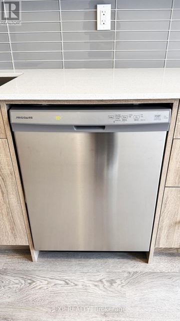 Toronto (Englemount-Lawrence) townhouse for rent - A stainless steel dishwasher is placed in a kitchen.