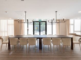 York apartment for rent - A conference room with a long table and chairs.